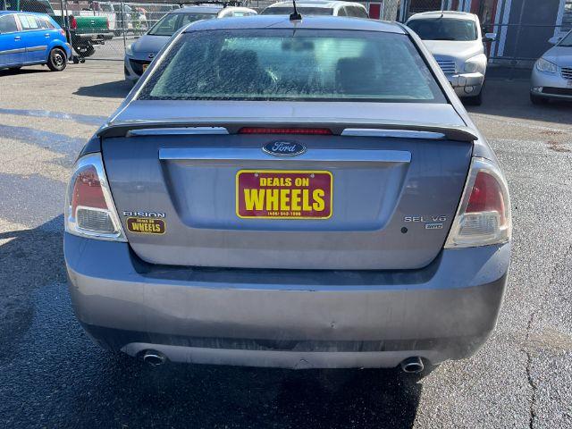 2007 Ford Fusion V6 SEL AWD (3FAHP021X7R) with an 3.0L V6 DOHC 24V engine, located at 1821 N Montana Ave., Helena, MT, 59601, 46.603447, -112.022781 - Photo #4