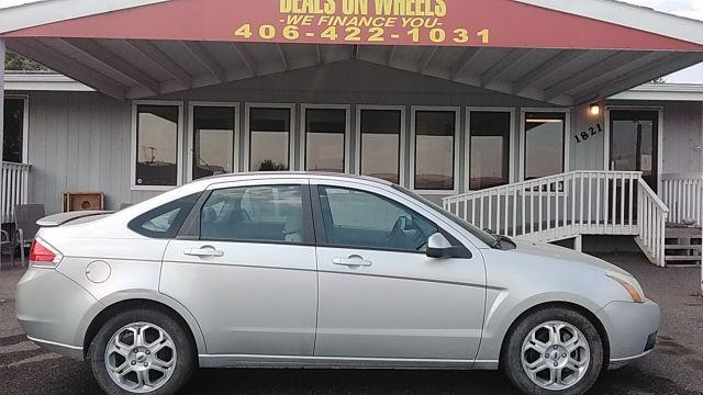 2009 Brilliant Silver Met Ford Focus SES Sedan (1FAHP36N89W) with an 2.0L L4 DOHC 16V engine, located at 1821 N Montana Ave., Helena, MT, 59601, 46.603447, -112.022781 - Photo #3