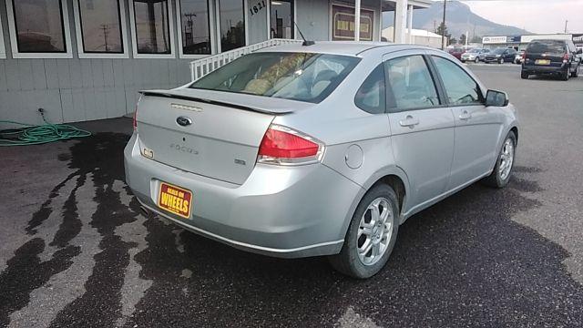 2009 Brilliant Silver Met Ford Focus SES Sedan (1FAHP36N89W) with an 2.0L L4 DOHC 16V engine, located at 1821 N Montana Ave., Helena, MT, 59601, 46.603447, -112.022781 - Photo #4