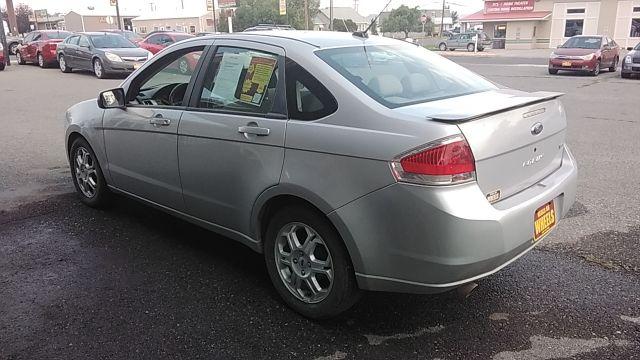 2009 Brilliant Silver Met Ford Focus SES Sedan (1FAHP36N89W) with an 2.0L L4 DOHC 16V engine, located at 1821 N Montana Ave., Helena, MT, 59601, 46.603447, -112.022781 - Photo #6