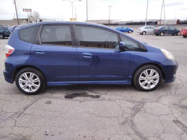 2009 Honda Fit Sport 5-Speed MT (JHMGE87409S) with an 1.5L L4 SOHC 16V engine, 5-Speed Manual transmission, located at 4047 Montana Ave., Billings, MT, 59101, 45.770847, -108.529800 - Photo #6