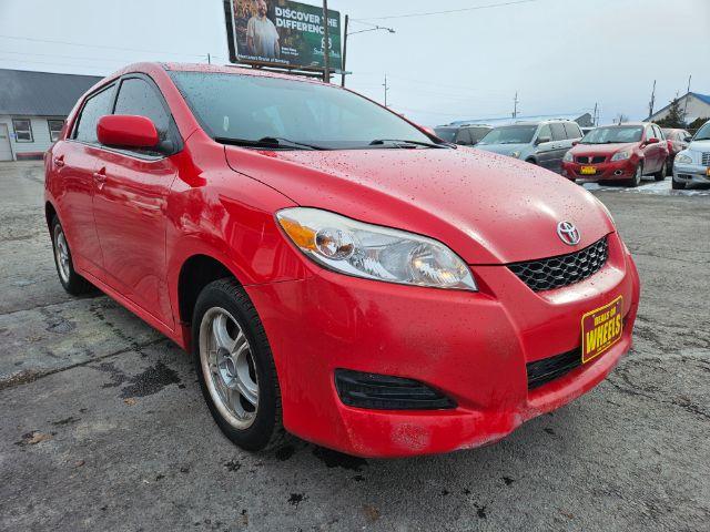 2009 Radiant Red Toyota Matrix Base 5-Speed MT (2T1KU40E09C) with an 1.8L L4 DOHC 16V engine, 5-Speed Manual transmission, located at 601 E. Idaho St., Kalispell, MT, 59901, 48.203983, -114.308662 - Photo #6