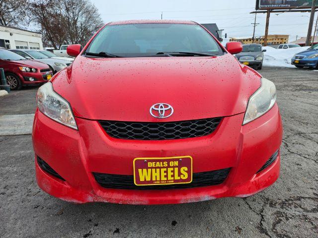 2009 Radiant Red Toyota Matrix Base 5-Speed MT (2T1KU40E09C) with an 1.8L L4 DOHC 16V engine, 5-Speed Manual transmission, located at 601 E. Idaho St., Kalispell, MT, 59901, 48.203983, -114.308662 - Photo #7