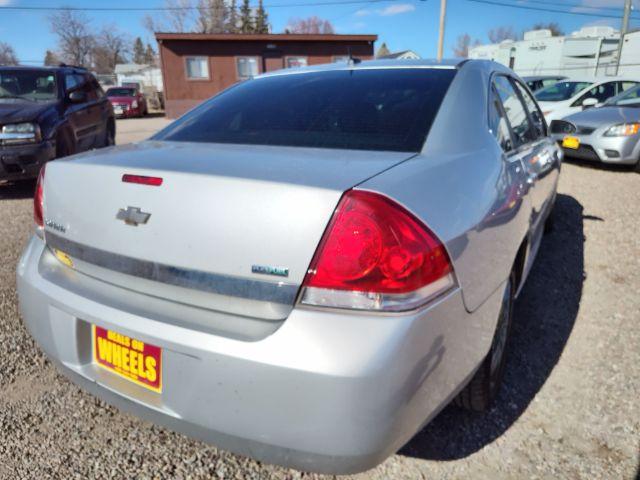 2011 Chevrolet Impala LS (2G1WA5EK3B1) with an 3.5L V6 OHV 16V FFV engine, 4-Speed Automatic transmission, located at 4801 10th Ave S,, Great Falls, MT, 59405, 47.494347, -111.229942 - Photo #4