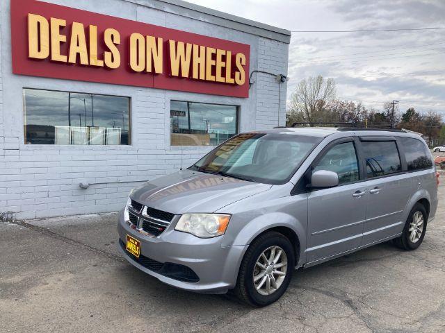 2013 Dodge Grand Caravan SXT (2C4RDGCG8DR) with an 3.6L V6 DOHC 24V engine, 6-Speed Automatic transmission, located at 4047 Montana Ave., Billings, MT, 59101, 45.770847, -108.529800 - Photo #0