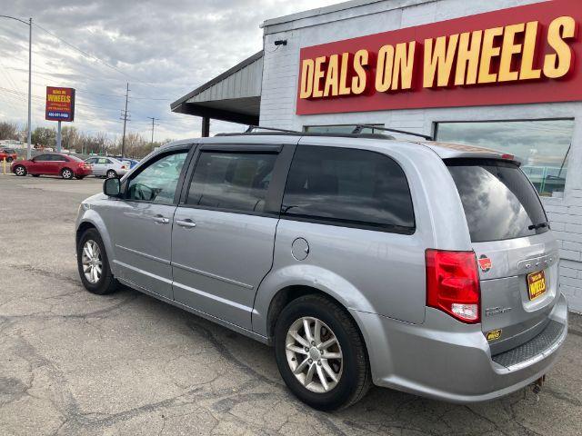 2013 Dodge Grand Caravan SXT (2C4RDGCG8DR) with an 3.6L V6 DOHC 24V engine, 6-Speed Automatic transmission, located at 4047 Montana Ave., Billings, MT, 59101, 45.770847, -108.529800 - Photo #1