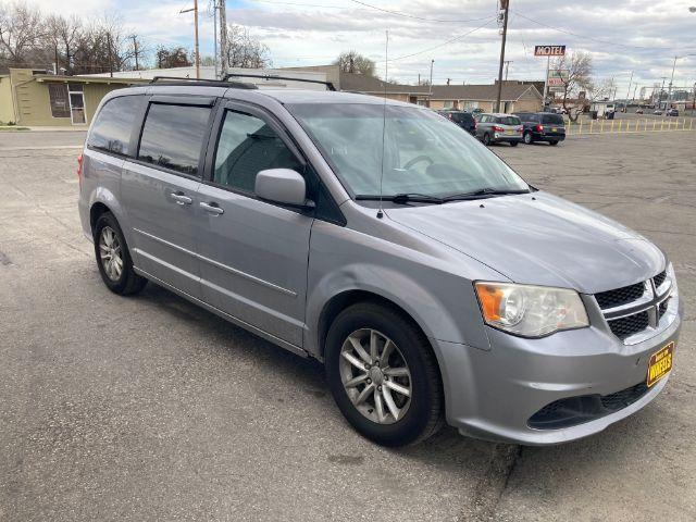 2013 Dodge Grand Caravan SXT (2C4RDGCG8DR) with an 3.6L V6 DOHC 24V engine, 6-Speed Automatic transmission, located at 4047 Montana Ave., Billings, MT, 59101, 45.770847, -108.529800 - Photo #2