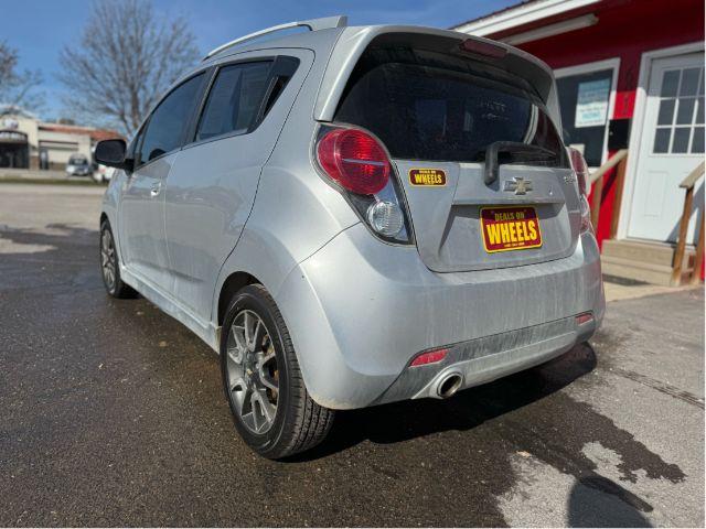 2014 Chevrolet Spark 2LT Auto (KL8CF6S9XEC) with an 1.2L L4 16V DOHC engine, Continuously Variabl transmission, located at 601 E. Idaho St., Kalispell, MT, 59901, 48.203983, -114.308662 - Photo #4