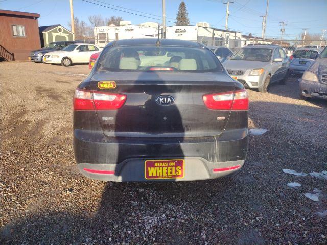 2013 Aurora Black Pearl Kia Rio LX (KNADM4A33D6) with an 1.6L L4 DOHC 16V engine, located at 4801 10th Ave S,, Great Falls, MT, 59405, 47.494347, -111.229942 - Photo #3