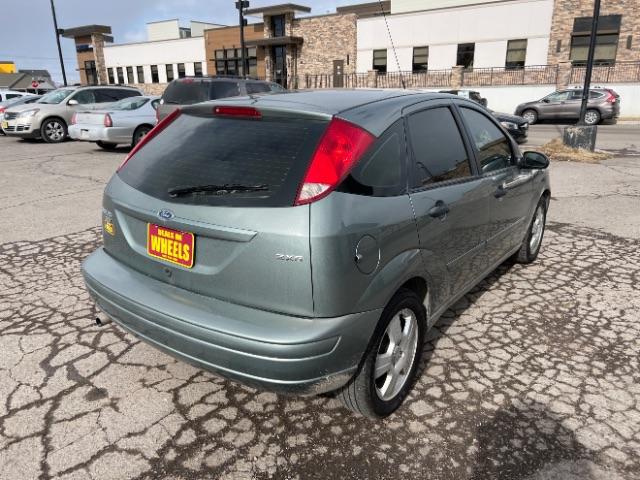 2005 Ford Focus ZX5 SES (3FAHP37N85R) with an 2.0L L4 DOHC 16V engine, located at 4047 Montana Ave., Billings, MT, 59101, 45.770847, -108.529800 - Photo #3