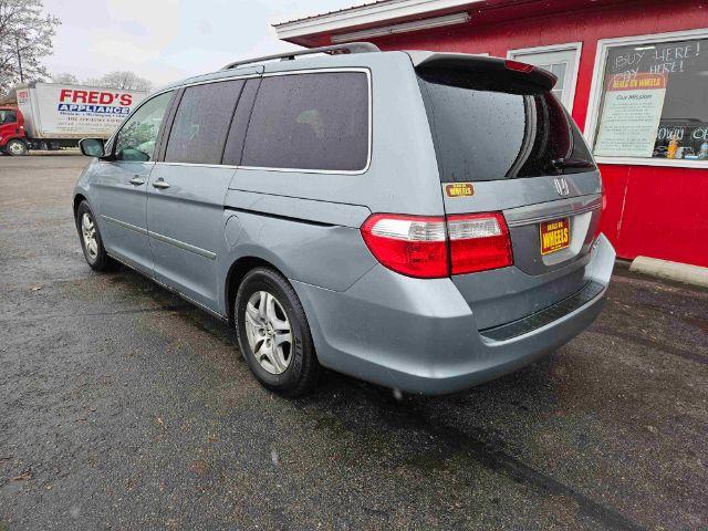2005 Honda Odyssey EX w/ Leather DVD (5FNRL38735B) with an 3.5L V6 SOHC 24V engine, 5-Speed Automatic transmission, located at 601 E. Idaho St., Kalispell, MT, 59901, 48.203983, -114.308662 - Photo #2