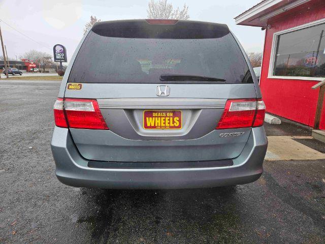 2005 Honda Odyssey EX w/ Leather DVD (5FNRL38735B) with an 3.5L V6 SOHC 24V engine, 5-Speed Automatic transmission, located at 601 E. Idaho St., Kalispell, MT, 59901, 48.203983, -114.308662 - Photo #3