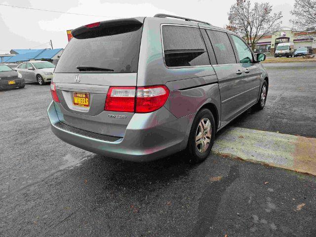 2005 Honda Odyssey EX w/ Leather DVD (5FNRL38735B) with an 3.5L V6 SOHC 24V engine, 5-Speed Automatic transmission, located at 601 E. Idaho St., Kalispell, MT, 59901, 48.203983, -114.308662 - Photo #4