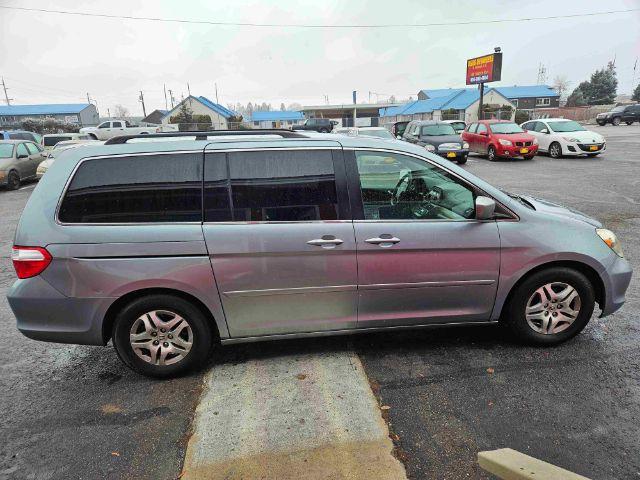 2005 Honda Odyssey EX w/ Leather DVD (5FNRL38735B) with an 3.5L V6 SOHC 24V engine, 5-Speed Automatic transmission, located at 601 E. Idaho St., Kalispell, MT, 59901, 48.203983, -114.308662 - Photo #5