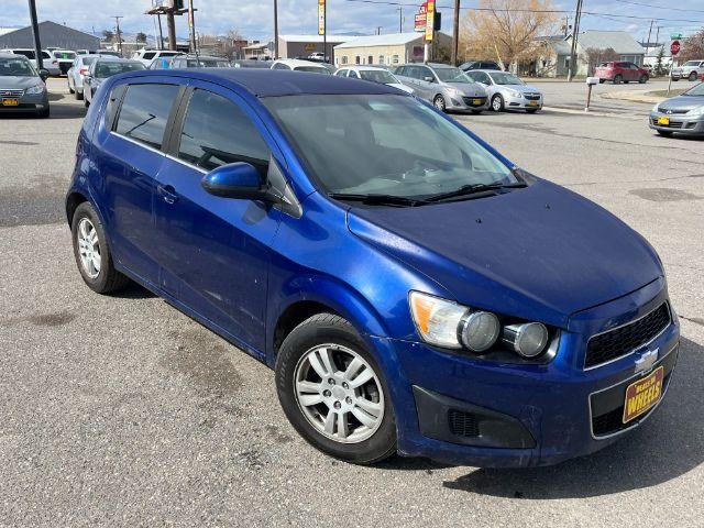 2014 Chevrolet Sonic LT Auto 5-Door (1G1JC6SG9E4) with an 1.8L L4 DOHC 24V engine, 6-Speed Automatic transmission, located at 1821 N Montana Ave., Helena, MT, 59601, 46.603447, -112.022781 - Photo #2
