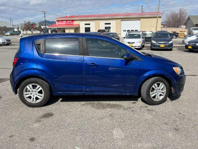 2014 Chevrolet Sonic LT Auto 5-Door (1G1JC6SG9E4) with an 1.8L L4 DOHC 24V engine, 6-Speed Automatic transmission, located at 1821 N Montana Ave., Helena, MT, 59601, 46.603447, -112.022781 - Photo #3