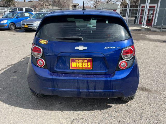 2014 Chevrolet Sonic LT Auto 5-Door (1G1JC6SG9E4) with an 1.8L L4 DOHC 24V engine, 6-Speed Automatic transmission, located at 1821 N Montana Ave., Helena, MT, 59601, 46.603447, -112.022781 - Photo #4