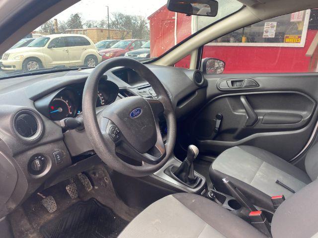 2017 Ford Fiesta S Sedan (3FADP4AJ0HM) with an 1.6L L4 DOHC 16V engine, located at 601 E. Idaho St., Kalispell, MT, 59901, 0.000000, 0.000000 - Photo #6