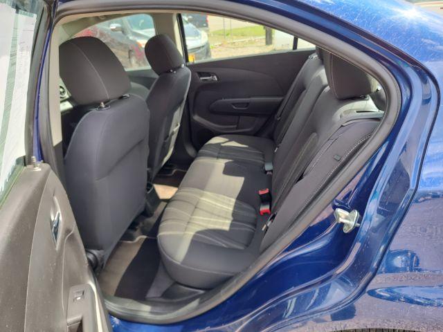 2014 Chevrolet Sonic LT Auto Sedan (1G1JC5SH6E4) with an 1.8L L4 DOHC 24V engine, 6-Speed Automatic transmission, located at 4801 10th Ave S,, Great Falls, MT, 59405, 47.494347, -111.229942 - Photo #11