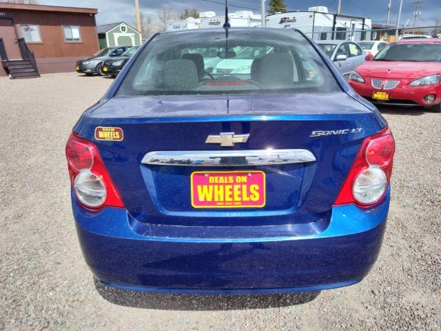 2014 Chevrolet Sonic LT Auto Sedan (1G1JC5SH6E4) with an 1.8L L4 DOHC 24V engine, 6-Speed Automatic transmission, located at 4801 10th Ave S,, Great Falls, MT, 59405, 0.000000, 0.000000 - Photo #3