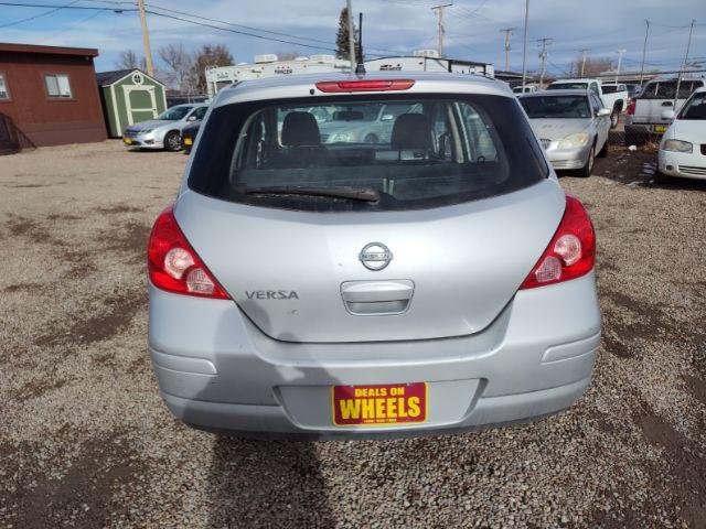 2011 Nissan Versa 1.8 SL Hatchback (3N1BC1CP9BL) with an 1.8L L4 DOHC 16V engine, 6 Speed Manual Trans transmission, located at 4801 10th Ave S,, Great Falls, MT, 59405, 47.494347, -111.229942 - Photo #3