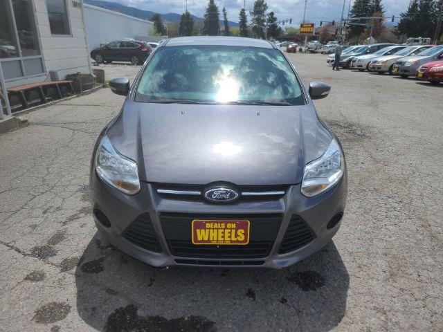 2014 Sterling Gray Metall Ford Focus SE Sedan (1FADP3F23EL) with an 2.0L L4 DOHC 16V engine, located at 1800 West Broadway, Missoula, 59808, (406) 543-1986, 46.881348, -114.023628 - Photo #1