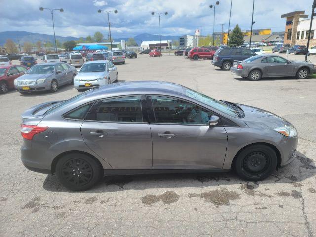 2014 Sterling Gray Metall Ford Focus SE Sedan (1FADP3F23EL) with an 2.0L L4 DOHC 16V engine, located at 1800 West Broadway, Missoula, 59808, (406) 543-1986, 46.881348, -114.023628 - Photo #2