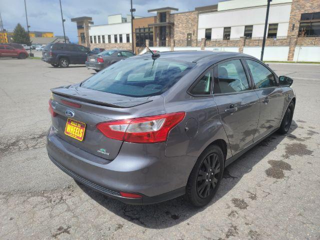 2014 Sterling Gray Metall Ford Focus SE Sedan (1FADP3F23EL) with an 2.0L L4 DOHC 16V engine, located at 1800 West Broadway, Missoula, 59808, (406) 543-1986, 46.881348, -114.023628 - Photo #3