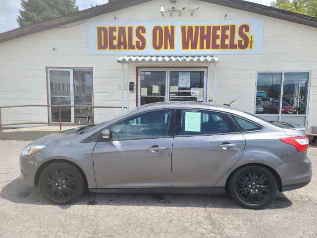 2014 Sterling Gray Metall Ford Focus SE Sedan (1FADP3F23EL) with an 2.0L L4 DOHC 16V engine, located at 1800 West Broadway, Missoula, 59808, (406) 543-1986, 46.881348, -114.023628 - Photo #5
