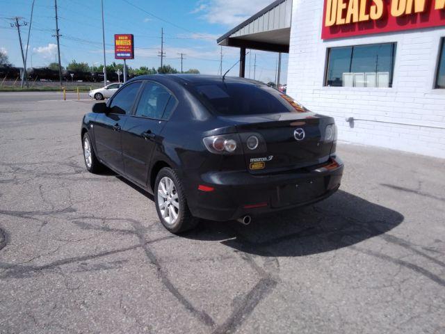 2007 Mazda MAZDA3 i Touring 4-Door (JM1BK32F671) with an 2.0L L4 DOHC 16V engine, located at 1821 N Montana Ave., Helena, MT, 59601, 46.603447, -112.022781 - Photo #2