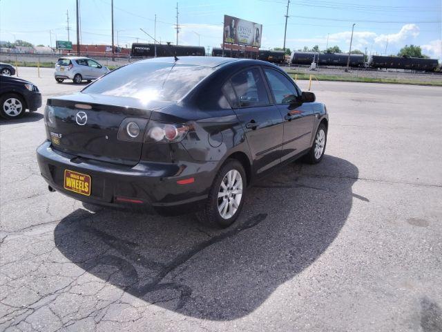 2007 Mazda MAZDA3 i Touring 4-Door (JM1BK32F671) with an 2.0L L4 DOHC 16V engine, located at 1821 N Montana Ave., Helena, MT, 59601, 46.603447, -112.022781 - Photo #4