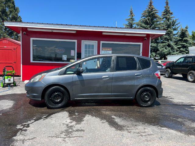 2012 Honda Fit 5-Speed MT (JHMGE8G34CC) with an 1.5L L4 SOHC 16V engine, 5-Speed Manual transmission, located at 601 E. Idaho St., Kalispell, MT, 59901, (406) 300-4664, 0.000000, 0.000000 - Photo #1