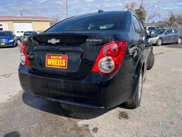 2016 Chevrolet Sonic LS Auto Sedan (1G1JA5SH2G4) with an 1.8L L4 DOHC 24V engine, 6-Speed Automatic transmission, located at 1821 N Montana Ave., Helena, MT, 59601, 46.603447, -112.022781 - Photo #2