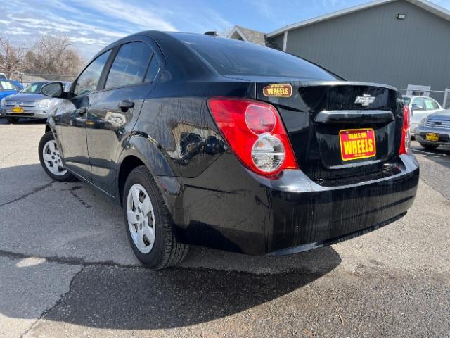 2016 Chevrolet Sonic LS Auto Sedan (1G1JA5SH2G4) with an 1.8L L4 DOHC 24V engine, 6-Speed Automatic transmission, located at 1821 N Montana Ave., Helena, MT, 59601, 46.603447, -112.022781 - Photo #3