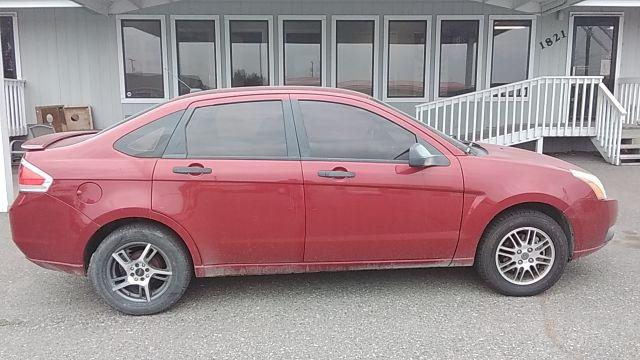 2010 Ford Focus SE Sedan (1FAHP3FN2AW) with an 2.0L L4 DOHC 16V engine, located at 1821 N Montana Ave., Helena, MT, 59601, 46.603447, -112.022781 - Photo #3