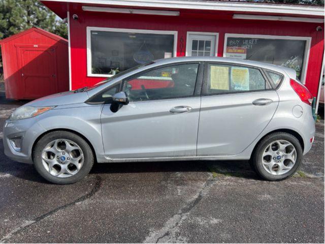 2012 Ford Fiesta SES Hatchback (3FADP4FJ5CM) with an 1.6L L4 DOHC 16V engine, located at 601 E. Idaho St., Kalispell, MT, 59901, 0.000000, 0.000000 - Photo #1