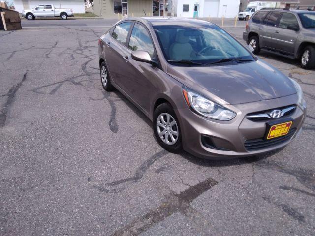 2012 Hyundai Accent GLS 4-Door (KMHCT4AE1CU) with an 1.6L L4 DOHC 16V engine, located at 4047 Montana Ave., Billings, MT, 59101, 45.770847, -108.529800 - Photo #3
