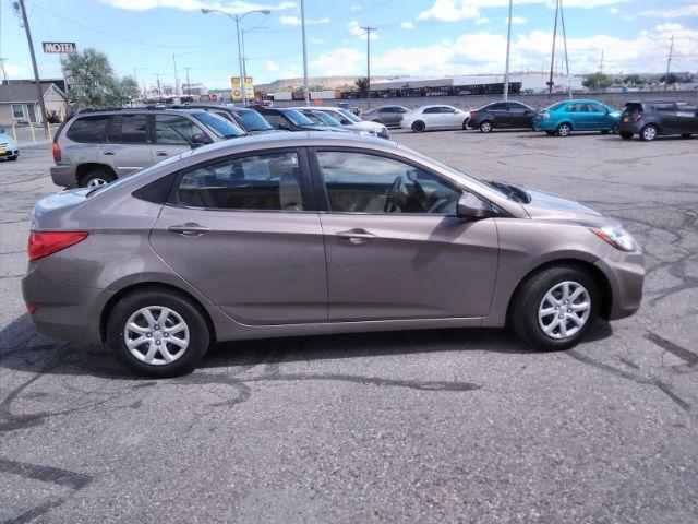 2012 Hyundai Accent GLS 4-Door (KMHCT4AE1CU) with an 1.6L L4 DOHC 16V engine, located at 4047 Montana Ave., Billings, MT, 59101, 45.770847, -108.529800 - Photo #4