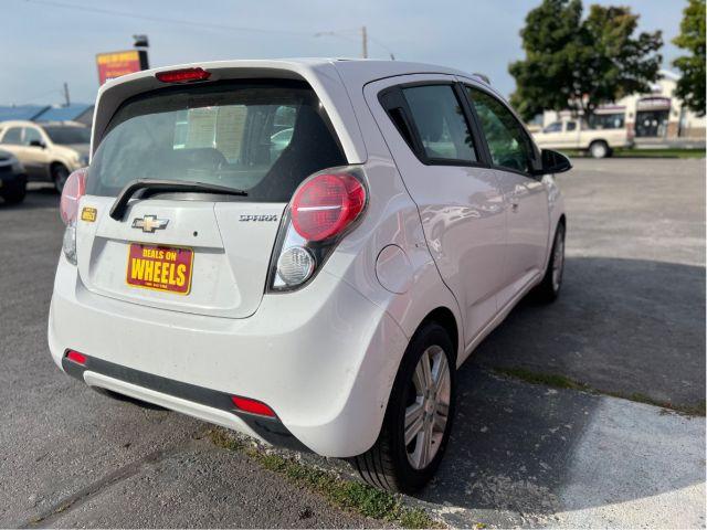 2014 Chevrolet Spark 1LT Auto (KL8CD6S94EC) with an 1.2L L4 16V DOHC engine, Continuously Variable Transmission transmission, located at 601 E. Idaho St., Kalispell, MT, 59901, 48.203983, -114.308662 - Photo #4
