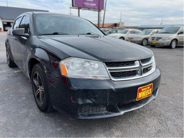 2013 Dodge Avenger Base (1C3CDZAB3DN) with an 2.4L L4 DOHC 16V engine, 4-Speed Automatic transmission, located at 4047 Montana Ave., Billings, MT, 59101, 45.770847, -108.529800 - Photo #6