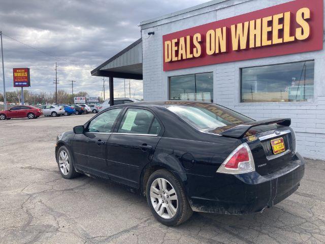 2007 Ford Fusion V6 SEL (3FAHP08117R) with an 3.0L V6 DOHC 24V engine, located at 4047 Montana Ave., Billings, MT, 59101, 45.770847, -108.529800 - Photo #5