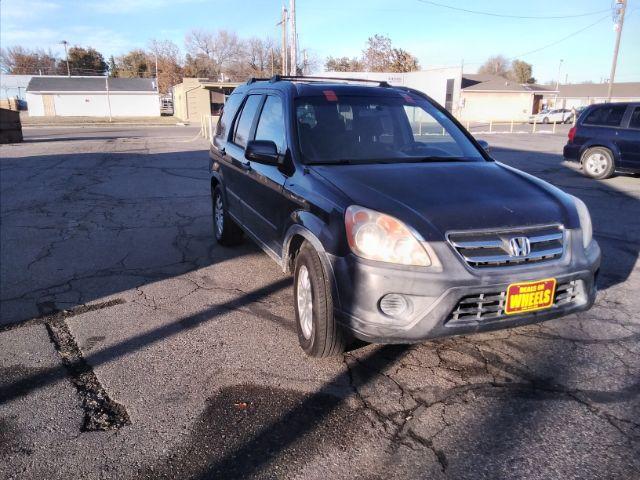 2006 Honda CR-V EX 4WD AT (JHLRD78806C) with an 2.4L L4 DOHC 16V engine, 5-Speed Automatic transmission, located at 4047 Montana Ave., Billings, MT, 59101, 45.770847, -108.529800 - Photo #3