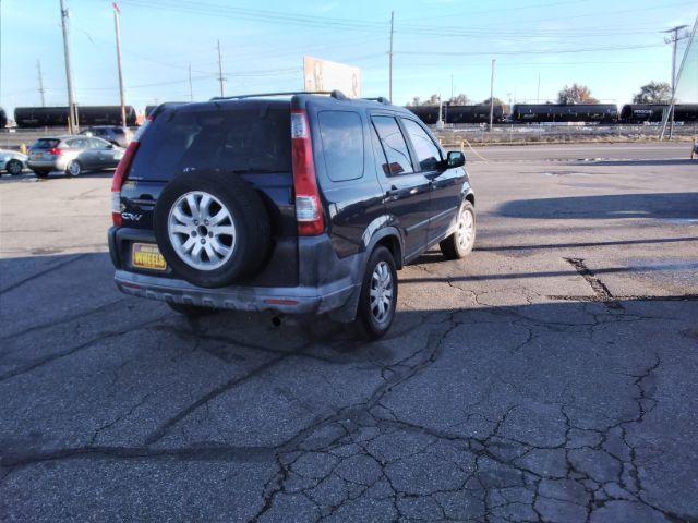 2006 Honda CR-V EX 4WD AT (JHLRD78806C) with an 2.4L L4 DOHC 16V engine, 5-Speed Automatic transmission, located at 4047 Montana Ave., Billings, MT, 59101, 45.770847, -108.529800 - Photo #5