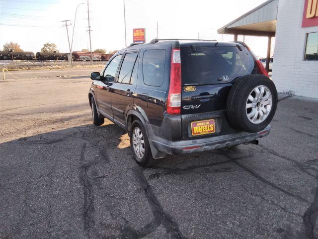 2006 Honda CR-V EX 4WD AT (JHLRD78806C) with an 2.4L L4 DOHC 16V engine, 5-Speed Automatic transmission, located at 4047 Montana Ave., Billings, MT, 59101, 45.770847, -108.529800 - Photo #7