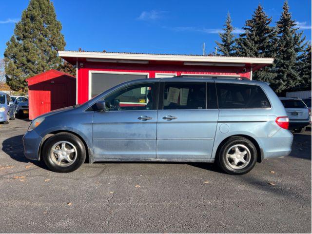 2005 Honda Odyssey Touring (5FNRL38895B) with an 3.5L V6 SOHC 24V engine, 5-Speed Automatic transmission, located at 601 E. Idaho St., Kalispell, MT, 59901, 0.000000, 0.000000 - Photo #1