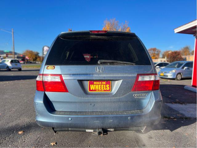 2005 Honda Odyssey Touring (5FNRL38895B) with an 3.5L V6 SOHC 24V engine, 5-Speed Automatic transmission, located at 601 E. Idaho St., Kalispell, MT, 59901, 0.000000, 0.000000 - Photo #3
