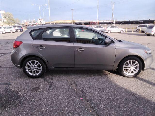 2012 Kia Forte 5-Door EX (KNAFU5A25C5) with an 2.0L L4 DOHC 16V engine, located at 4047 Montana Ave., Billings, MT, 59101, 45.770847, -108.529800 - Photo #4