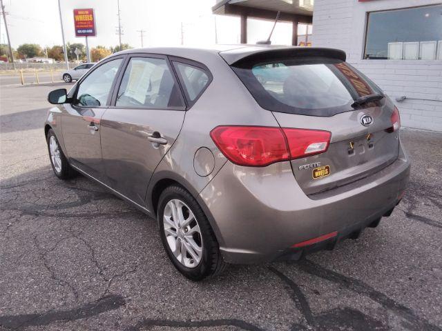 2012 Kia Forte 5-Door EX (KNAFU5A25C5) with an 2.0L L4 DOHC 16V engine, located at 4047 Montana Ave., Billings, MT, 59101, 45.770847, -108.529800 - Photo #6