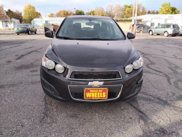 2014 Chevrolet Sonic LT Auto Sedan (1G1JC5SH7E4) with an 1.8L L4 DOHC 24V engine, 6-Speed Automatic transmission, located at 4047 Montana Ave., Billings, MT, 59101, 45.770847, -108.529800 - Photo #1