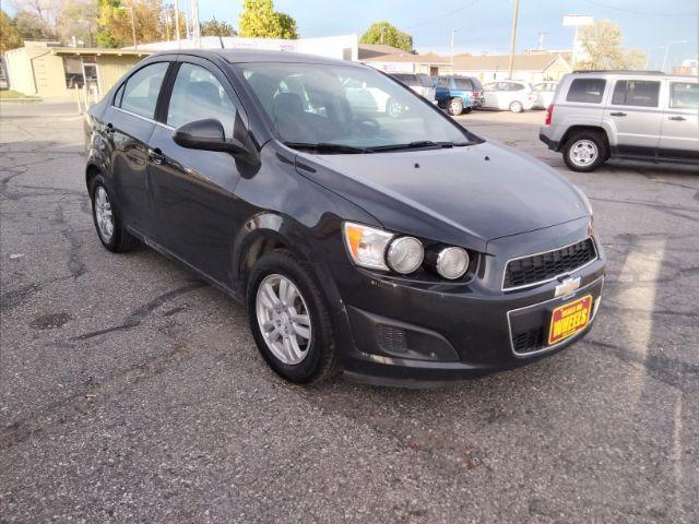 2014 Chevrolet Sonic LT Auto Sedan (1G1JC5SH7E4) with an 1.8L L4 DOHC 24V engine, 6-Speed Automatic transmission, located at 4047 Montana Ave., Billings, MT, 59101, 45.770847, -108.529800 - Photo #2